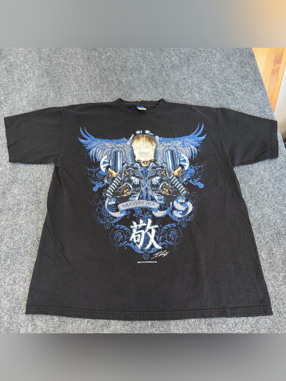 Black Graphic Short‑Sleeve Tee with Blue & Gold Skull Motif